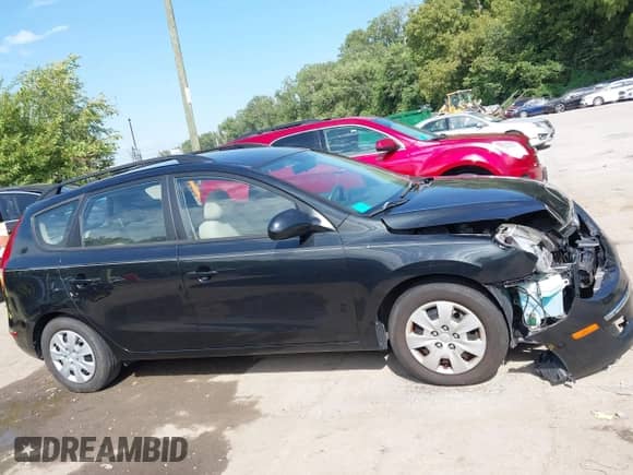 2010 Hyundai Elantra SE z VIN KMHDC8AE5AU063201, wystawiony jako IAAI lot #42995022 z przebiegiem 123 791 mil mil oraz . Historia ofert i sprzedaży dostępna na DreamBid. Obrazek 13.