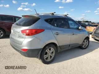 2011 Hyundai Tucson Limited z VIN KM8JU3ACXBU122083, wystawiony jako Copart lot #71179764 z przebiegiem 154 164 mil mil oraz Czysty tytuł • Clean title. Historia ofert i sprzedaży dostępna na DreamBid. Obrazek 3.