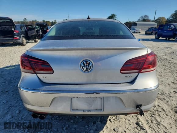 ✅ 2014 Volkswagen CC Executive • VIN: WVWRN7AN2EE527477 • Лот: 93368975. Опубликован ранее на Copart с пробегом Не указан. Бесплатный доступ к архиву аукционных продаж из США и подробный отчёт об истории автомобиля на DreamBid. Изображение 6.