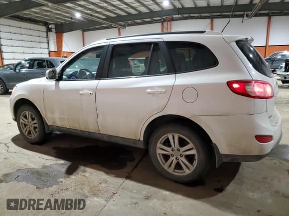 ✅ 2012 Hyundai Santa Fe GLS • VIN: 5XYZGDAG6CG113424 • Lot: 84898144. Listed on Copart with 140,697 mi. Free auction sales archive from the USA and detailed vehicle history report at DreamBid. Image 2.