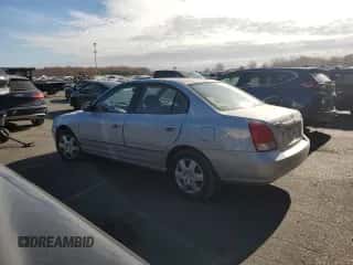 2001 Hyundai Elantra GLS z VIN KMHDN45D71U057338, wystawiony jako Copart lot #79084024 z przebiegiem 137 887 mil mil oraz Szkoda całkowita • Salvage title. Historia ofert i sprzedaży dostępna na DreamBid. Obrazek 2.