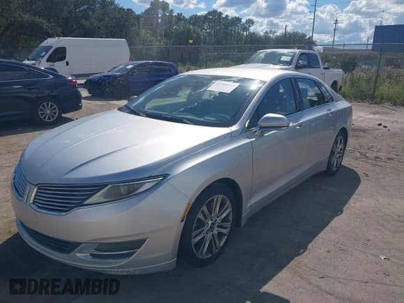 ✅ 2013 Lincoln MKZ • VIN: 3LN6L2GKXDR819314 • Lot: 43309512. Wystawiony na IAAI z przebiegiem 166 525 mil. Bezpłatny archiwum sprzedaży aukcyjnych z USA i szczegółowy raport historii pojazdu na DreamBid. Zdjęcie 12.