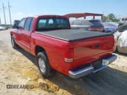 ✅ 2000 Dodge Dakota Sport • VIN: 1B7GL2AX0YS685498 • Lot: 42069753. Listed on IAAI with 56,269 mi. Free auction sales archive from the USA and detailed vehicle history report at DreamBid. Image 3.