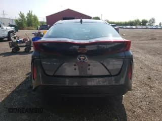 ✅ 2022 Toyota Prius LE • VIN: JTDKAMFP1N3223218 • Lot: 58561985. Wystawiony na Copart z przebiegiem 98 017 mil. Bezpłatny archiwum sprzedaży aukcyjnych z USA i szczegółowy raport historii pojazdu na DreamBid. Zdjęcie 6.