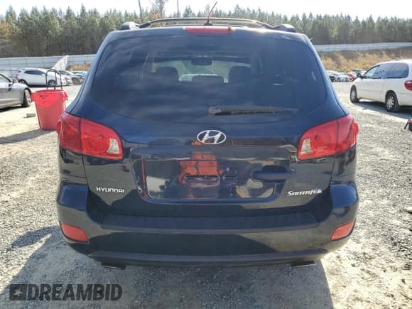 ✅ 2007 Hyundai Santa Fe SE • VIN: 5NMSH13E27H081785 • Lot: 82134504. Listed on Copart with 194,433 mi. Free auction sales archive from the USA and detailed vehicle history report at DreamBid. Image 6.