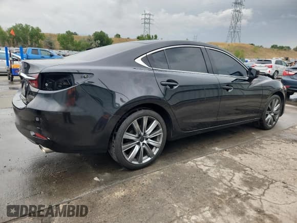 ✅ 2021 Mazda 6 Touring • VIN: JM1GL1VM5M1604540 • Lot: 69967485. Listed on Copart with 73,948 mi. Free auction sales archive from the USA and detailed vehicle history report at DreamBid. Image 3.