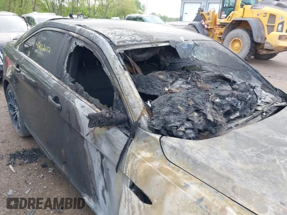 ✅ 2015 Ford Taurus SHO • VIN: 1FAHP2KT2FG186714 • Lot: 42182632. Listed on IAAI with 113,500 mi. Free auction sales archive from the USA and detailed vehicle history report at DreamBid. Image 12.