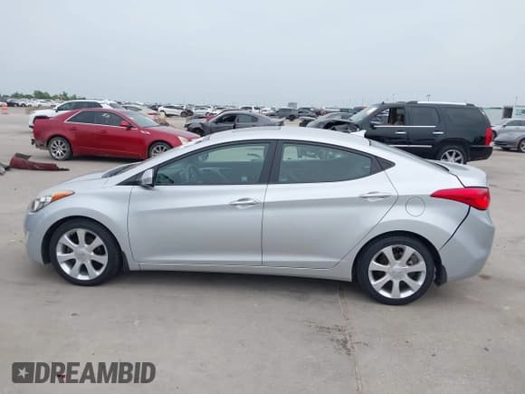 ✅ 2013 Hyundai Elantra GLS • VIN: 5NPDH4AE7DH268063 • Lot: 42269526. Listed on IAAI with 123,067 mi. Free auction sales archive from the USA and detailed vehicle history report at DreamBid. Image 14.
