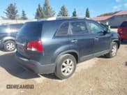 ✅ 2012 Kia Sorento LX • VIN: 5XYKT3A62CG269586 • Lot: 43633976. Listed on IAAI with 153,623 mi. Free auction sales archive from the USA and detailed vehicle history report at DreamBid. Image 4.