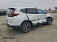 ✅ 2022 Honda CR-V Touring • VIN: 5J6RT6H99NL018999 • Lot: 94290615. Wystawiony na Copart z przebiegiem 12 761 mil. Bezpłatny archiwum sprzedaży aukcyjnych z USA i szczegółowy raport historii pojazdu na DreamBid. Zdjęcie 3.