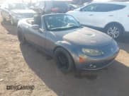 ✅ 2006 Mazda MX-5 Miata Grand Touring • VIN: JM1NC25FX60109726 • Lot: 41525204. Wystawiony na IAAI z przebiegiem 127 342 mil. Bezpłatny archiwum sprzedaży aukcyjnych z USA i szczegółowy raport historii pojazdu na DreamBid. Zdjęcie 1.