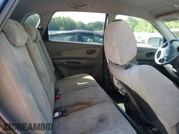 2005 Hyundai Tucson GLS z VIN KM8JN12DX5U052209, wystawiony jako Copart lot #78738093 z przebiegiem 130 287 mil mil oraz Nie do naprawy • Non repairable. Historia ofert i sprzedaży dostępna na DreamBid. Obrazek 11.