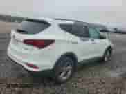 2017 Hyundai Santa Fe 2.4L с VIN 5NMZU3LBXHH011173, выставлен на аукционе Copart как лот 90112645 с пробегом 112 815 миль миль и Списание • Salvage title. История ставок и продаж доступна на DreamBid. Изображение 3.