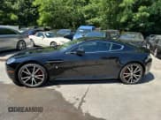 ✅ 2011 Aston Martin Vantage • VIN: SCFEFBAK2BGC14745 • Lot: 67236345. Wystawiony na Copart z przebiegiem 77 389 mil. Bezpłatny archiwum sprzedaży aukcyjnych z USA i szczegółowy raport historii pojazdu na DreamBid. Zdjęcie 13.