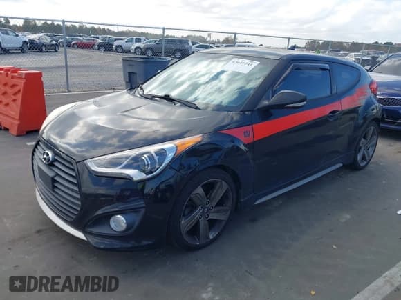✅ 2014 Hyundai Veloster Turbo • VIN: KMHTC6AE3EU183231 • Lot: 43641241. Listed on IAAI with 154,712 mi. Free auction sales archive from the USA and detailed vehicle history report at DreamBid. Image 2.