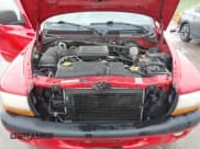 ✅ 2000 Dodge Dakota Sport • VIN: 1B7GG2ANXYS621732 • Lot: 41930673. Wystawiony na IAAI z przebiegiem 145 653 mil. Bezpłatny archiwum sprzedaży aukcyjnych z USA i szczegółowy raport historii pojazdu na DreamBid. Zdjęcie 10.