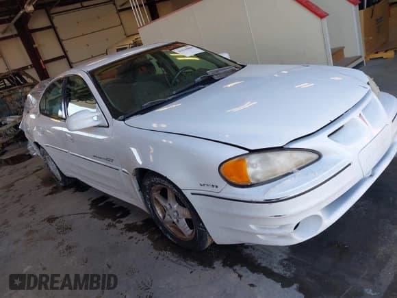 ✅ 1999 Pontiac Grand Am GT1 • VIN: 1G2NW52E2XM800431 • Lot: 41620806. Listed on IAAI with 164,257 mi. Free auction sales archive from the USA and detailed vehicle history report at DreamBid. Image 1.