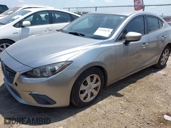 ✅ 2015 Mazda 3 i Sport • VIN: 3MZBM1U75FM164647 • Lot: 42944630. Wystawiony na IAAI z przebiegiem 138 463 mil. Bezpłatny archiwum sprzedaży aukcyjnych z USA i szczegółowy raport historii pojazdu na DreamBid. Zdjęcie 2.