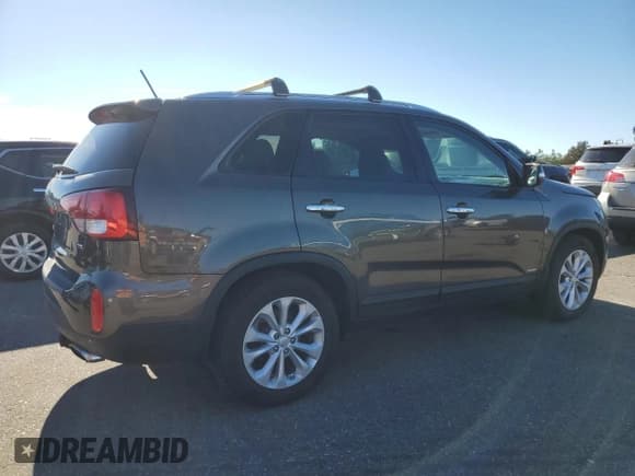 ✅ 2015 Kia Sorento EX • VIN: 5XYKUDA77FG600856 • Лот: 86596355. Опубликован ранее на Copart с пробегом 142 257 миль. Бесплатный доступ к архиву аукционных продаж из США и подробный отчёт об истории автомобиля на DreamBid. Изображение 3.