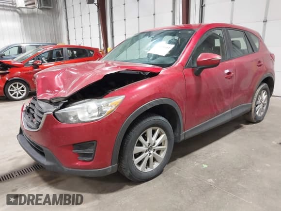 ✅ 2016 Mazda CX-5 Sport • VIN: JM3KE4BY1G0618658 • Lot: 42839303. Wystawiony na IAAI z przebiegiem 234 137 mil. Bezpłatny archiwum sprzedaży aukcyjnych z USA i szczegółowy raport historii pojazdu na DreamBid. Zdjęcie 2.