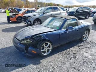 ✅ 2002 Mazda MX-5 Miata Cloth • VIN: JM1NB353820227217 • Lot: 43536318. Listed on IAAI with 124,504 mi. Free auction sales archive from the USA and detailed vehicle history report at DreamBid. Image 2.