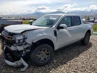 ✅ 2023 Ford Maverick Lariat Advanced • VIN: 3FTTW8G90PRA72406 • Лот: 55452175. Опубликован ранее на Copart с пробегом 20 429 миль. Бесплатный доступ к архиву аукционных продаж из США и подробный отчёт об истории автомобиля на DreamBid. Изображение 1.