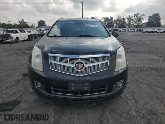 ✅ 2012 Cadillac SRX Performance Collection • VIN: 3GYFNBE31CS577198 • Lot: 81932555. Listed on Copart with 194,810 mi. Free auction sales archive from the USA and detailed vehicle history report at DreamBid. Image 5.