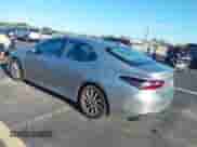 2023 Toyota Camry LE z VIN 4T1C11AK9PU144502, wystawiony jako IAAI lot #43307396 z przebiegiem 146 171 mil mil oraz . Historia ofert i sprzedaży dostępna na DreamBid. Obrazek 3.