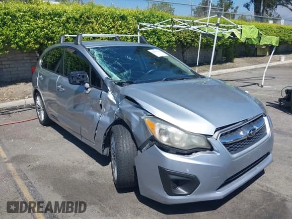 ✅ 2012 Subaru Impreza Premium • VIN: JF1GPAE66CH229646 • Lot: 42837558. Listed on IAAI with 118,893 mi. Free auction sales archive from the USA and detailed vehicle history report at DreamBid. Image 6.