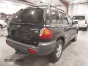 ✅ 2004 Hyundai Santa Fe GLS • VIN: KM8SC73E74U654567 • Lot: 43571152. Listed on IAAI with 167,999 mi. Free auction sales archive from the USA and detailed vehicle history report at DreamBid. Image 4.