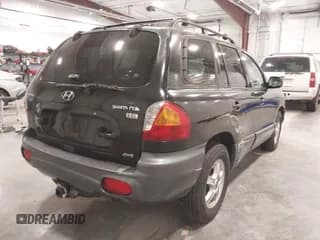 ✅ 2004 Hyundai Santa Fe GLS • VIN: KM8SC73E74U654567 • Лот: 43571152. Опубликован ранее на IAAI с пробегом 167 999 миль. Бесплатный доступ к архиву аукционных продаж из США и подробный отчёт об истории автомобиля на DreamBid. Изображение 4.