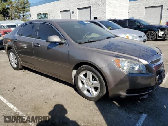 ✅ 2012 Chevrolet Malibu 1LS • VIN: 1G1ZB5E00CF156167 • Lot: 77576674. Listed on Copart with 86,713 mi. Free auction sales archive from the USA and detailed vehicle history report at DreamBid. Image 4.