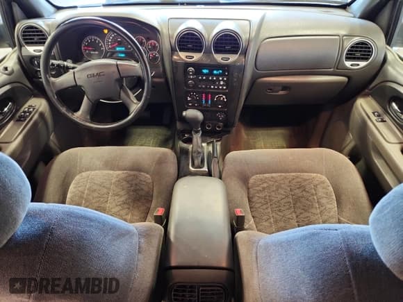 ✅ 2004 GMC Envoy SLE • VIN: 1GKDT13S542422288 • Лот: 86544755. Опубликован ранее на Copart с пробегом 171 264 миль. Бесплатный доступ к архиву аукционных продаж из США и подробный отчёт об истории автомобиля на DreamBid. Изображение 8.