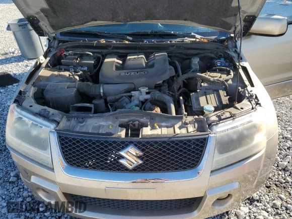 ✅ 2008 Suzuki Grand Vitara w/Spare & Cargo Covers • VIN: JS3TD941684101655 • Lot: 82326355. Wystawiony na Copart z przebiegiem 126 643 mil. Bezpłatny archiwum sprzedaży aukcyjnych z USA i szczegółowy raport historii pojazdu na DreamBid. Zdjęcie 12.