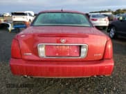 ✅ 2005 Cadillac DeVille DHS • VIN: 1G6KE57Y95U239407 • Лот: 81643834. Опубликован ранее на Copart с пробегом 153 199 миль. Бесплатный доступ к архиву аукционных продаж из США и подробный отчёт об истории автомобиля на DreamBid. Изображение 6.