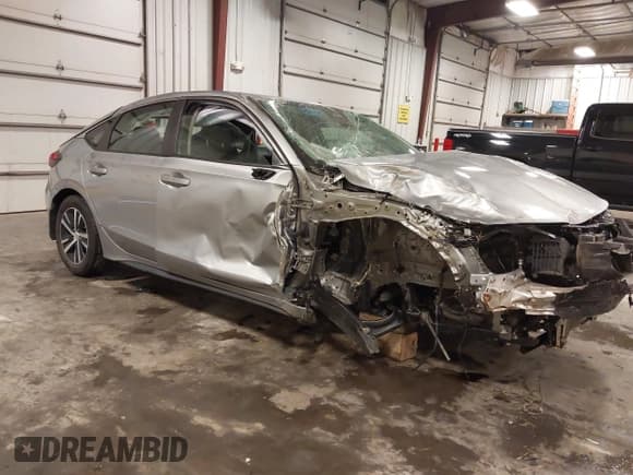 ✅ 2023 Honda Civic LX • VIN: 19XFL2H56PE013429 • Lot: 43223544. Listed on IAAI with 23,000 mi. Free auction sales archive from the USA and detailed vehicle history report at DreamBid. Image 1.