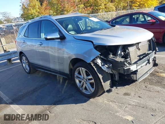 ✅ 2018 Chevrolet Equinox Premier • VIN: 2GNAXVEV6J6312308 • Лот: 43537199. Опубликован ранее на IAAI с пробегом 169 894 миль. Бесплатный доступ к архиву аукционных продаж из США и подробный отчёт об истории автомобиля на DreamBid. Изображение 1.