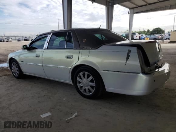✅ 2006 Cadillac DTS 1SC • VIN: 1G6KD57Y06U108774 • Лот: 91999725. Опубликован ранее на Copart с пробегом 99 135 миль. Бесплатный доступ к архиву аукционных продаж из США и подробный отчёт об истории автомобиля на DreamBid. Изображение 2.