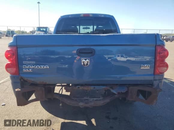 2005 Dodge Dakota SLT z VIN 1D7HE48N15S297020, wystawiony jako Copart lot #73988444 z przebiegiem 211 537 mil mil oraz Szkoda całkowita • Salvage title. Historia ofert i sprzedaży dostępna na DreamBid. Obrazek 6.