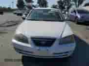 2004 Hyundai Elantra GLS with VIN KMHDN46D34U725333, listed as a Copart auction lot 71259335 with 242,751 mi miles and Salvage title. Bid and sale history available at DreamBid. Image 5.