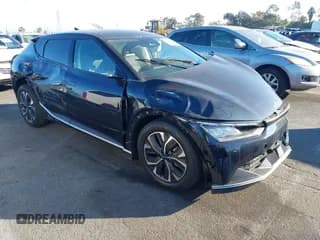 ✅ 2024 Kia EV6 Wind • VIN: KNDC34LA9R5220446 • Lot: 41044693. Wystawiony na IAAI z przebiegiem 1 789 mil. Bezpłatny archiwum sprzedaży aukcyjnych z USA i szczegółowy raport historii pojazdu na DreamBid. Zdjęcie 1.