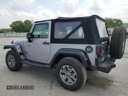✅ 2017 Jeep Wrangler Sport • VIN: 1C4AJWAG8HL711293 • Лот: 59358425. Опубликован ранее на Copart с пробегом 74 427 миль. Бесплатный доступ к архиву аукционных продаж из США и подробный отчёт об истории автомобиля на DreamBid. Изображение 2.
