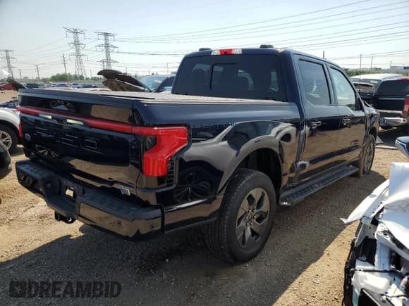 ✅ 2023 Ford F-150 Lightning Lariat • VIN: 1FTVW1EL3PWG17560 • Lot: 64416105. Listed on Copart with 25,183 mi. Free auction sales archive from the USA and detailed vehicle history report at DreamBid. Image 3.