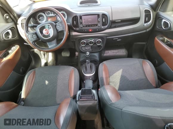 ✅ 2014 FIAT 500L Trekking • VIN: ZFBCFADHXEZ005956 • Lot: 76737924. Listed on Copart with 110,880 mi. Free auction sales archive from the USA and detailed vehicle history report at DreamBid. Image 8.