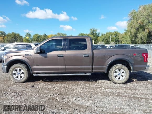 ✅ 2015 Ford F-150 Lariat • VIN: 1FTFW1EG8FKD09927 • Lot: 43373363. Listed on IAAI with 151,038 mi. Free auction sales archive from the USA and detailed vehicle history report at DreamBid. Image 14.