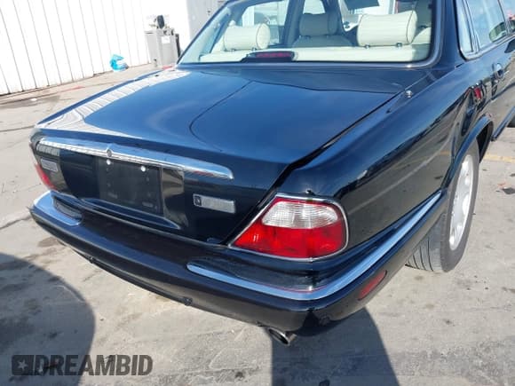 ✅ 2003 Jaguar XJ 8 • VIN: SAJDA14C03LF58706 • Lot: 41619740. Listed on IAAI with 95,293 mi. Free auction sales archive from the USA and detailed vehicle history report at DreamBid. Image 16.