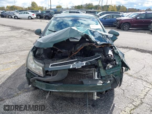 ✅ 2014 Chevrolet Cruze 1LT • VIN: 1G1PC5SB8E7448009 • Лот: 43512807. Опубликован ранее на IAAI с пробегом 254 343 миль. Бесплатный доступ к архиву аукционных продаж из США и подробный отчёт об истории автомобиля на DreamBid. Изображение 13.