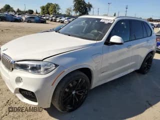 ✅ 2017 BMW X5 xDrive40e • VIN: 5UXKT0C37H0V96403 • Lot: 91932915. Listed on Copart with 100,502 mi. Free auction sales archive from the USA and detailed vehicle history report at DreamBid. Image 1.