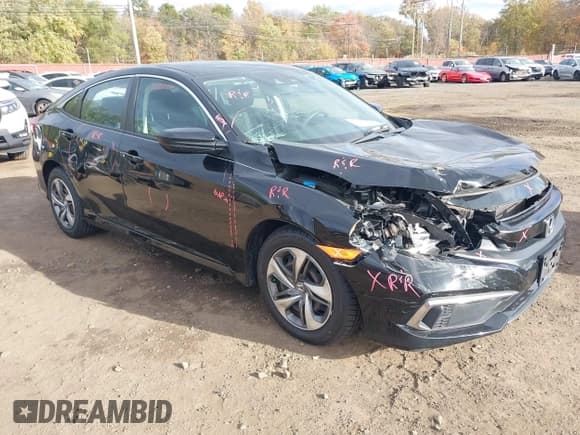 ✅ 2019 Honda Civic LX • VIN: 2HGFC2F68KH511559 • Lot: 43460821. Listed on IAAI with 64,419 mi. Free auction sales archive from the USA and detailed vehicle history report at DreamBid. Image 17.