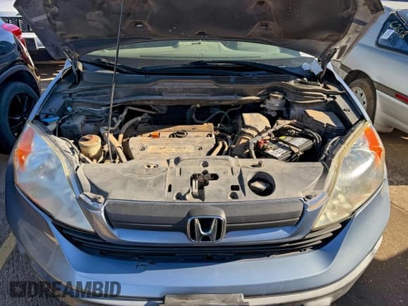 ✅ 2007 Honda CR-V LX • VIN: JHLRE383X7C073266 • Lot: 94758605. Wystawiony na Copart z przebiegiem 193 006 mil. Bezpłatny archiwum sprzedaży aukcyjnych z USA i szczegółowy raport historii pojazdu na DreamBid. Zdjęcie 7.